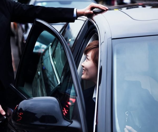 businessman-opening-car-door-for-businesswoman-dur-2024-10-23-08-32-05-utc-1-1-4